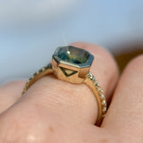 2.18ct Emerald Cut Parti Madagascar Sapphire Low Profile Bezel Solitaire Ring with Pavé Set Diamonds in 14k Green Gold