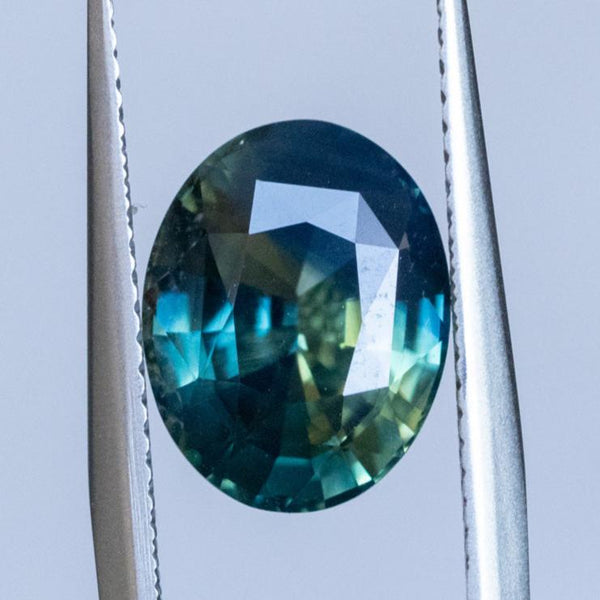 4.58CT OVAL MADAGASCAR SAPPHIRE, PARTI BLUE GREEN YELLOW, 11.20X8.76X5.54MM