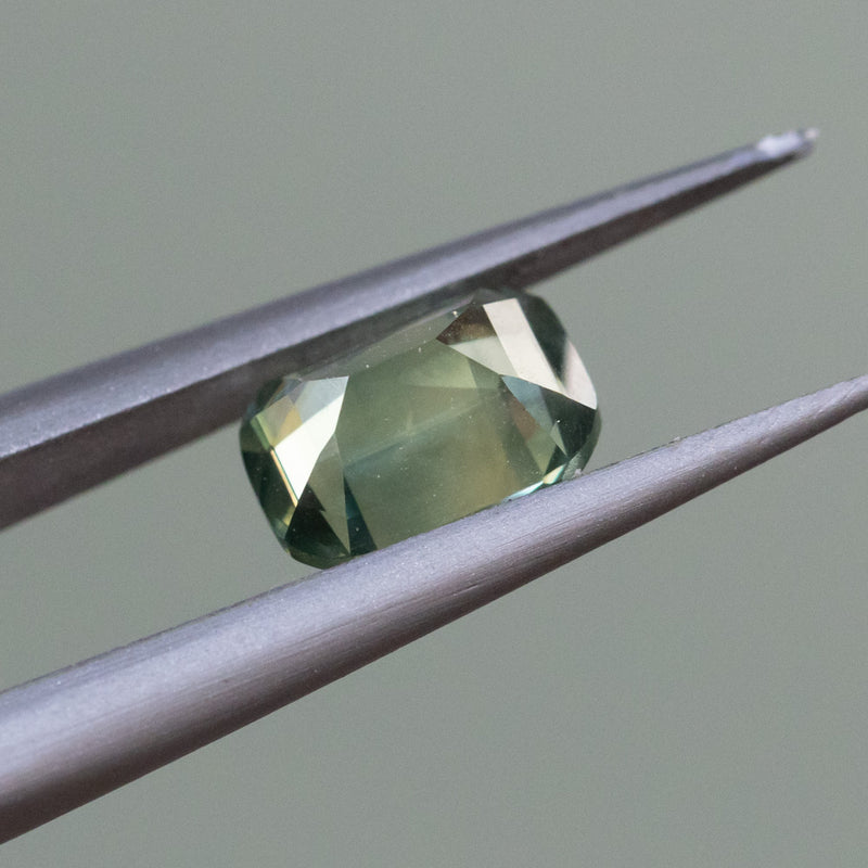 1.55CT ELONGATED CUSHION NIGERIAN SAPPHIRE, PARTI LIGHT GREEN YELLOW, 7.21X5.24X4.05MM, UNTREATED