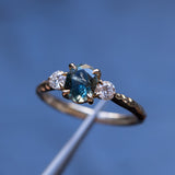 1.36ct Oval Montana Sapphire and Lab Diamond Three Stone Ring in 14K Yellow Gold with Evergreen Texture