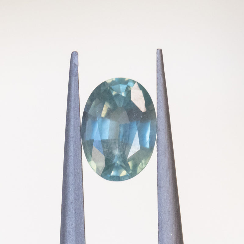 0.98CT OVAL MONTANA SAPPHIRE, LIGHT AQUA BLUE SEAFOAM, UNTREATED, 7.03X5.08X3.23MM