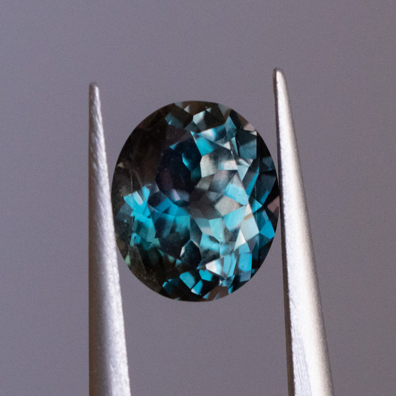 2.29CT OVAL SONGEAN SAPPHIRE, COLOR SHIFTING TEAL GREEN TO PURPLE, UNTREATED, 8.5X7X4.68MM