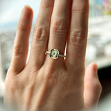 1.14ct Emerald Cut Parti Montana Sapphire Low Profile Bezel Solitaire Ring with Pavé Set Diamonds in 14k Green Gold