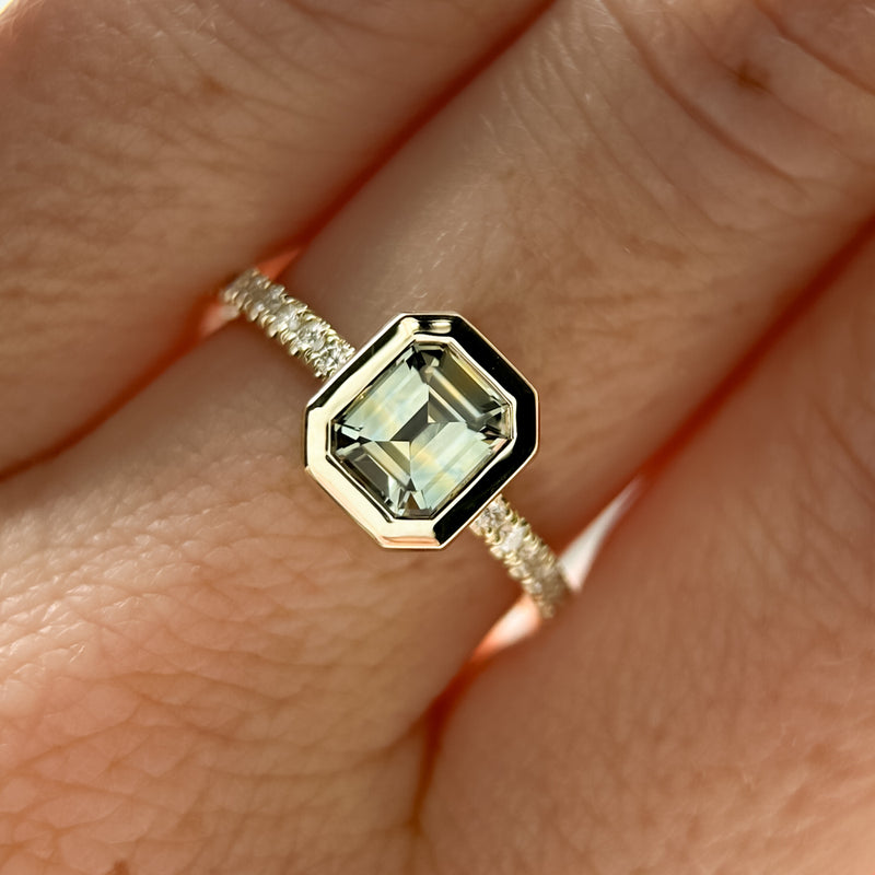 1.14ct Emerald Cut Parti Montana Sapphire Low Profile Bezel Solitaire Ring with Pavé Set Diamonds in 14k Green Gold