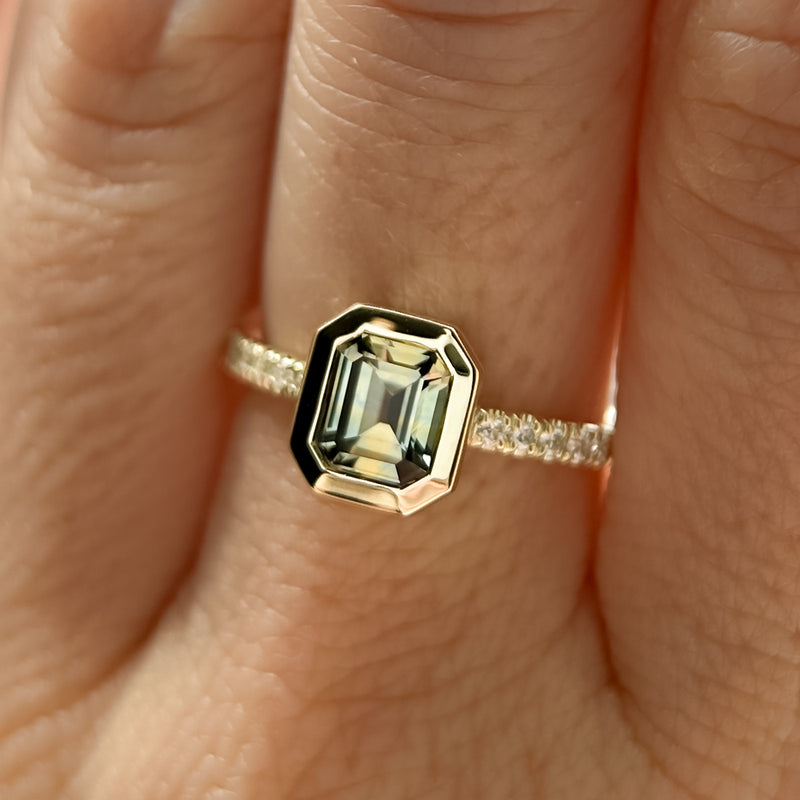 1.14ct Emerald Cut Parti Montana Sapphire Low Profile Bezel Solitaire Ring with Pavé Set Diamonds in 14k Green Gold