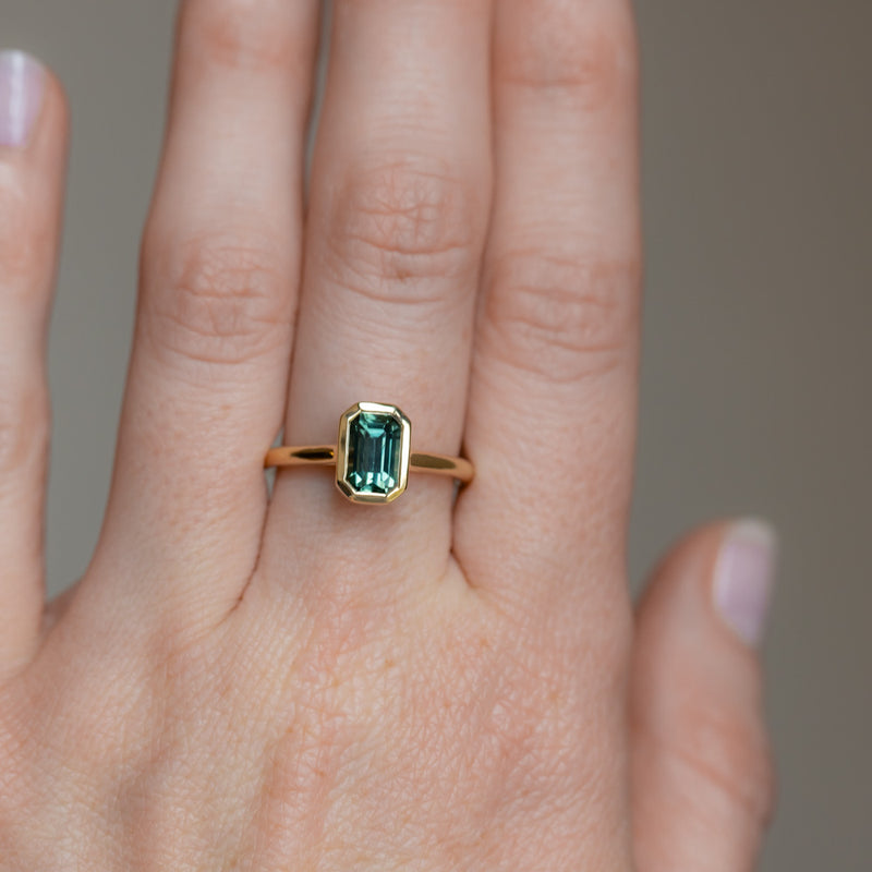 1.61ct Untreated Emerald Cut Green Sapphire Contemporary Bezel Set Ring in 18k Yellow Gold