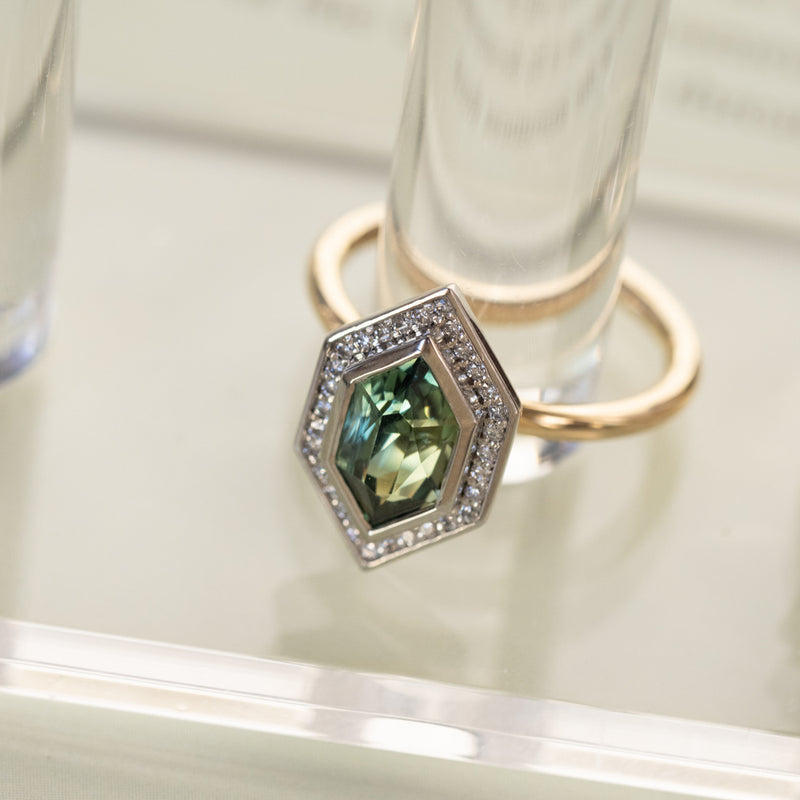 2.17ct Elongated Madagascar Teal Green Sapphire Bezel Set Diamond Halo Ring in Two-tone Platinum and Yellow Gold