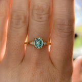 1.20ct Oval Brilliant Teal Montana Sapphire and Princess Cut Diamond Rapids Low Profile Ring in 14k Yellow Gold