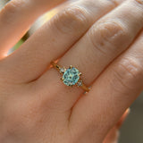 1.20ct Oval Brilliant Teal Montana Sapphire and Princess Cut Diamond Rapids Low Profile Ring in 14k Yellow Gold