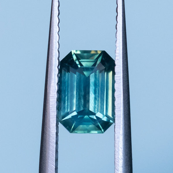 1.29CT EMERALD CUT MADAGASCAR SAPPHIRE, EMERALD GREEN WITH TEAL, 7.47X5.05X3.37MM