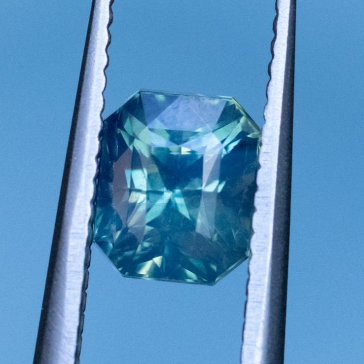 1.73CT RADIANT CUT MADAGASCAR SAPPHIRE, OPALESCENT TEAL GREEN AND BLUE, 6.5X5.5X5.2MM