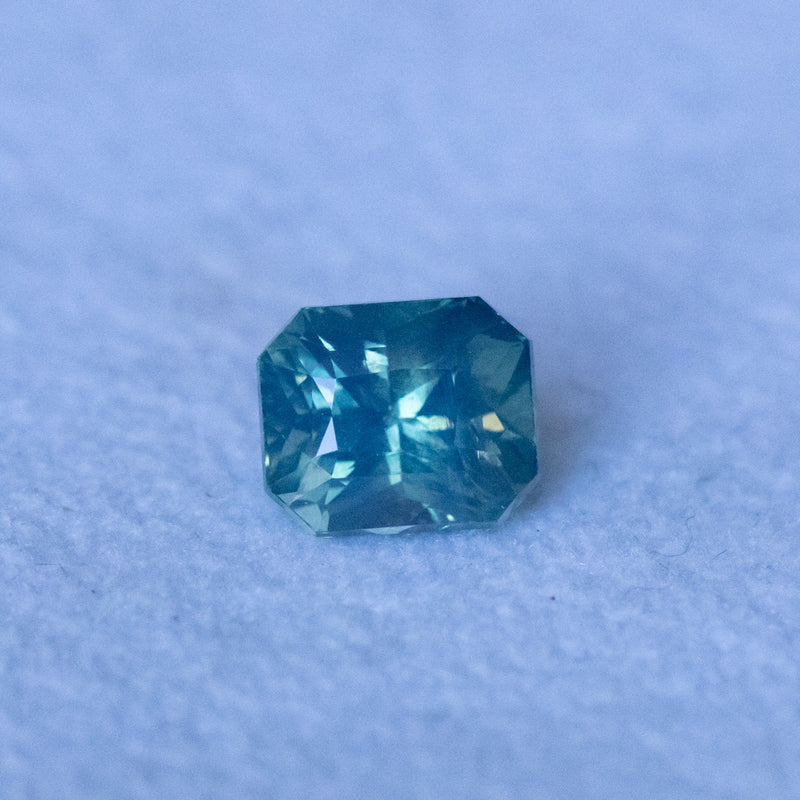 1.73CT RADIANT CUT MADAGASCAR SAPPHIRE, OPALESCENT TEAL GREEN AND BLUE, 6.5X5.5X5.2MM