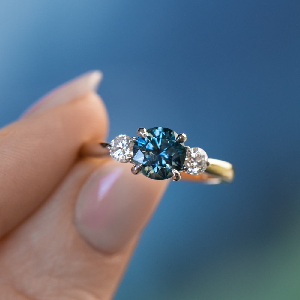 1.57ct Ocean Blue Round Montana Sapphire and Lab Diamond Three