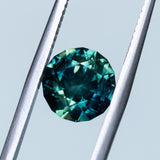 2.7CT FANCY ROUND AUSTRALIAN SAPPHIRE, DEEP PARTI GREEN YELLOW TEAL, UNTREATED, 7.8X5MM