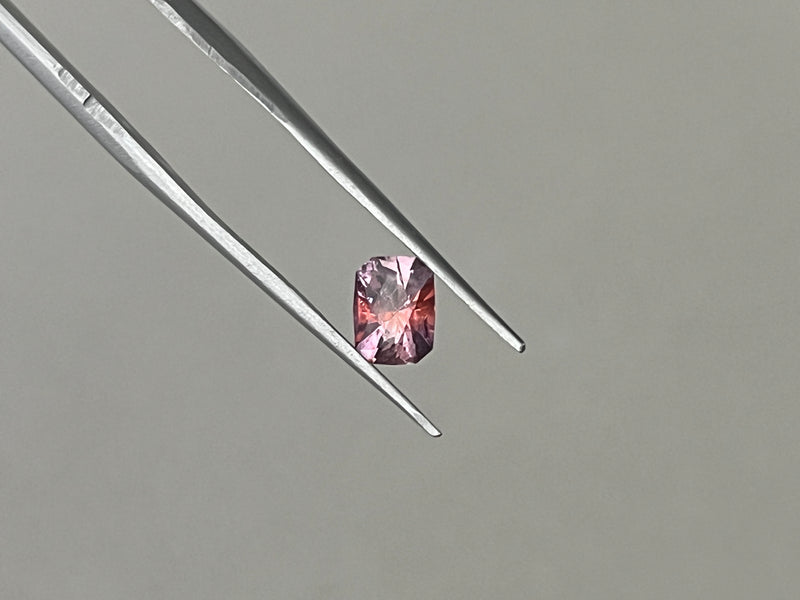 1.00CT FANCY ELONGATED CUSHION MONTANA SAPPHIRE, BI COLOR PINK AND RED, 6.8X5.2MM