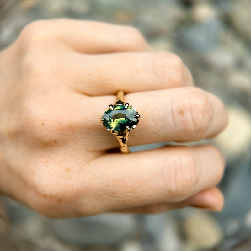 3.29ct Untreated Oval Parti Green Sapphire Low Profile 6 Prong Evergreen Carved Solitaire in 14k Yellow Gold