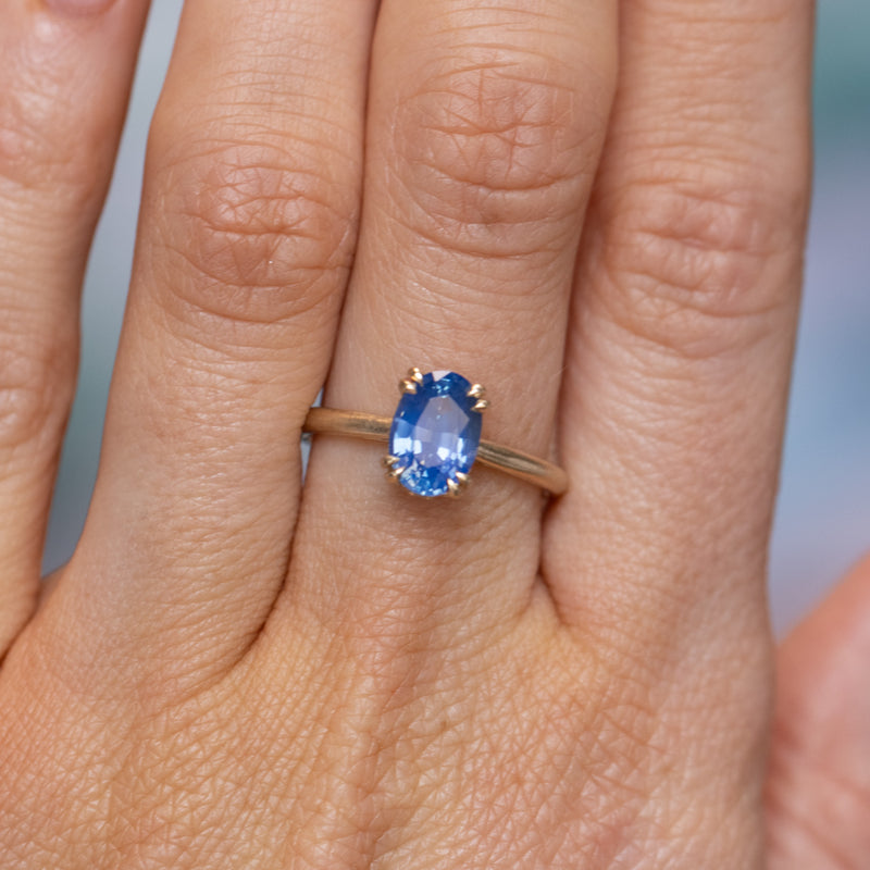 1.81ct Opalescent Oval Blue Sapphire Hidden Halo Solitaire in Satin Finished 14k Yellow Gold