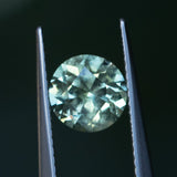 1.79CT ROUND PRECISION CUT MONTANA SAPPHIRE, LIGHT GREEN WITH PARTI BLUE, 7.3x4.71MM