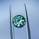 1.93CT ROUND PRECISION CUT AUSTRALIAN SAPPHIRE, GREEN WITH YELLOW AND BLUE, 7X5MM