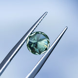 1.93CT ROUND PRECISION CUT AUSTRALIAN SAPPHIRE, GREEN WITH YELLOW AND BLUE, 7X5MM