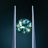 1.93CT ROUND PRECISION CUT AUSTRALIAN SAPPHIRE, GREEN WITH YELLOW AND BLUE, 7X5MM