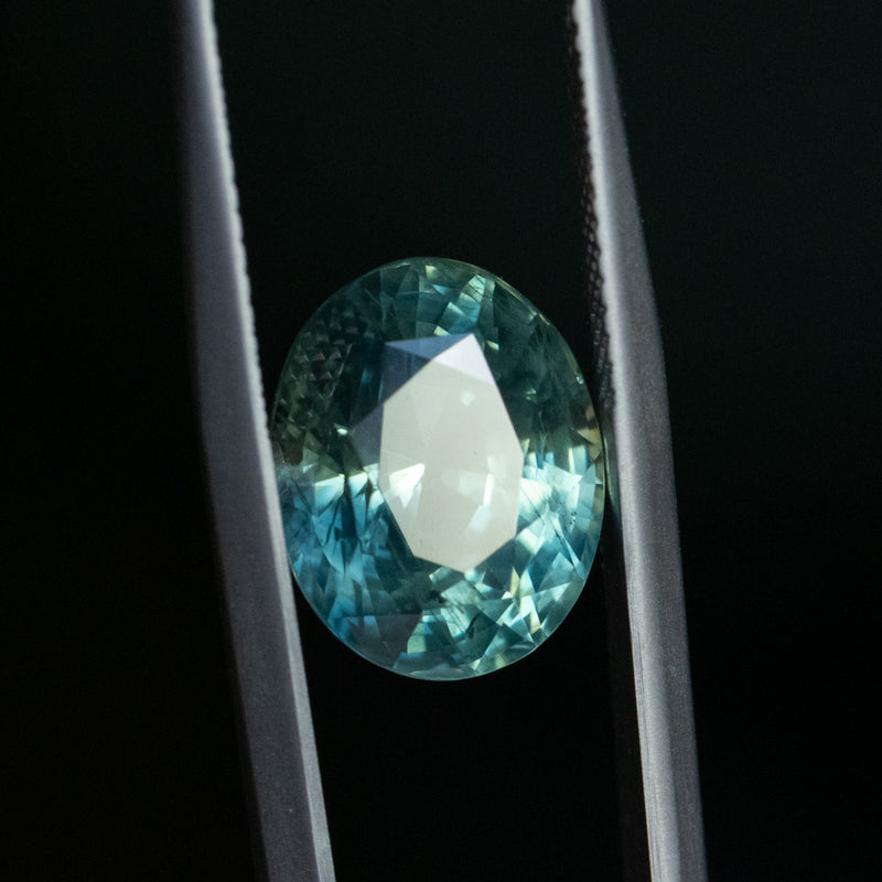 7.19CT OVAL MADAGASCAR SAPPHIRE, LIGHT-MEDIUM TEAL BLUE GREEN, 12X9.67X7.54MM EARLY ACCESS