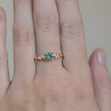 0.57ct Round Untreated Australian Light Teal Sapphire and Diamond Starry Night Low Profile Solitaire in 14k Yellow Gold