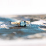 1.36ct Parti Blue Emerald Cut Montana Sapphire Low Profile East West Solitaire in 14k Yellow Gold