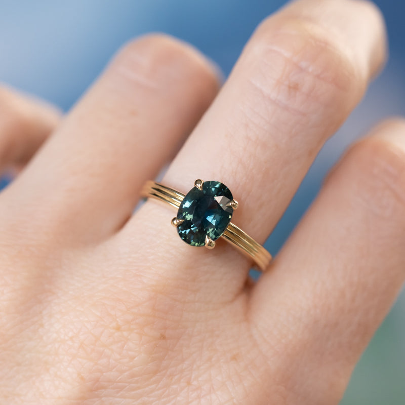 2.58ct Untreated Teal Oval Madagascar Sapphire Low Profile Tri-Band "Three Winds" 4 Prong Solitaire in 14k Yellow Gold