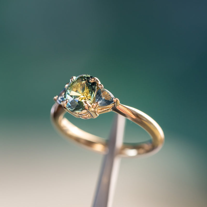 1.68ct Oval Untreated Madagascar Parti Sapphire and Trillion Sapphire Three Stone Low Profile Ring in 14k Yellow Gold