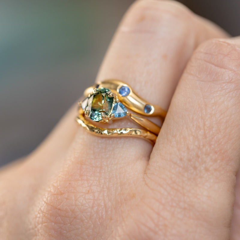 1.68ct Oval Untreated Madagascar Parti Sapphire and Trillion Sapphire Three Stone Low Profile Ring in 14k Yellow Gold