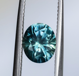 1.98ct Oval Precision Cut Teal Montana Sapphire and Princess Cut Diamond Rapids Low Profile Ring in 14k Yellow Gold