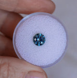1.40CT ROUND PRECISION CUT MONTANA SAPPHIRE, MEDIUM OCEAN BLUE TEAL, 6.6X4.3MM