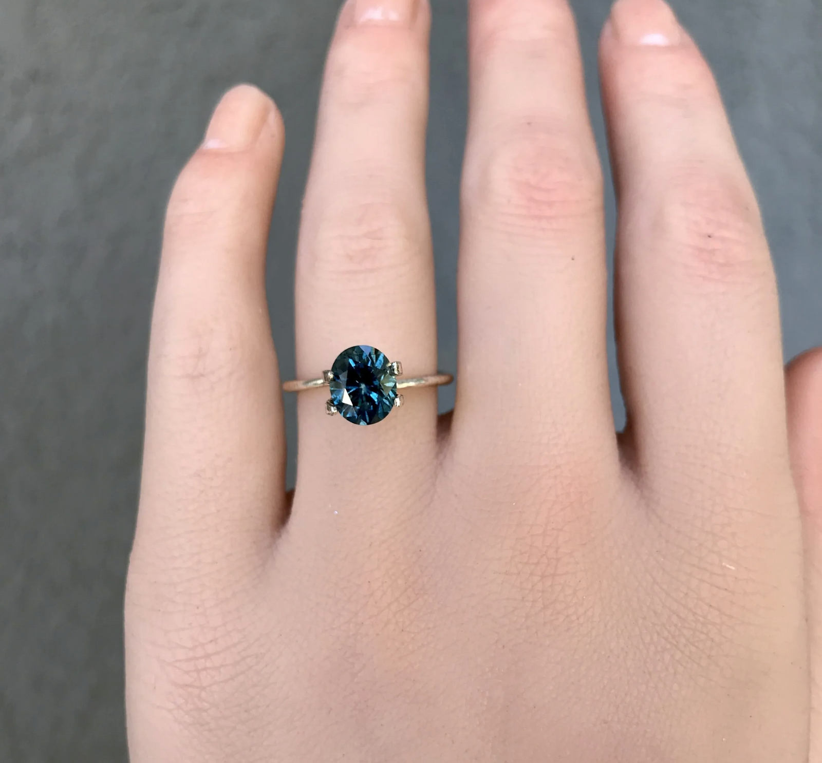 2.10CT OVAL BRILLIANT PRECISION CUT MONTANA SAPPHIRE, MIDNIGHT
