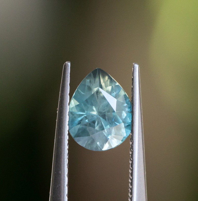 1.20ct Silky Teal Pear Sapphire Low Profile 5 Prong Tapered Solitaire in 14k Yellow Gold