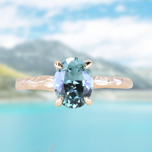 1.58ct Oval Untreated Light Blue Montana Sapphire Evergreen Carved 4 Prong Solitaire in 14k Yellow Gold