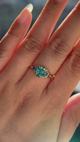 1.82ct Round Teal Precision Cut Montana Sapphire and Trillion Sapphire Low Profile Three Stone Ring in 18k Yellow Gold