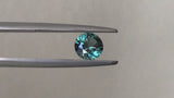 1.47CT ROUND PRECISION CUT MONTANA SAPPHIRE, TEAL GREEN, 6.75MM