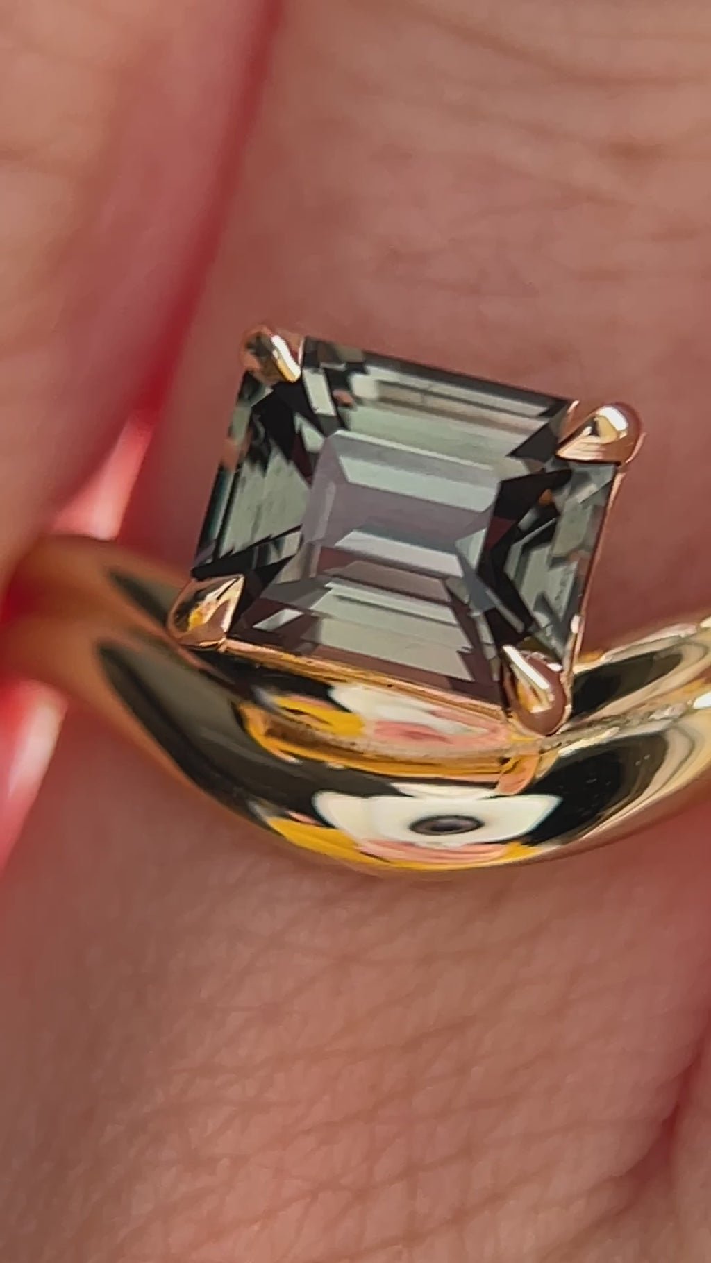 1.65ct Emerald Cut Color Shifting Madagascar Sapphire Prong Set Ripple Contour Solitaire in 14k Yellow Gold