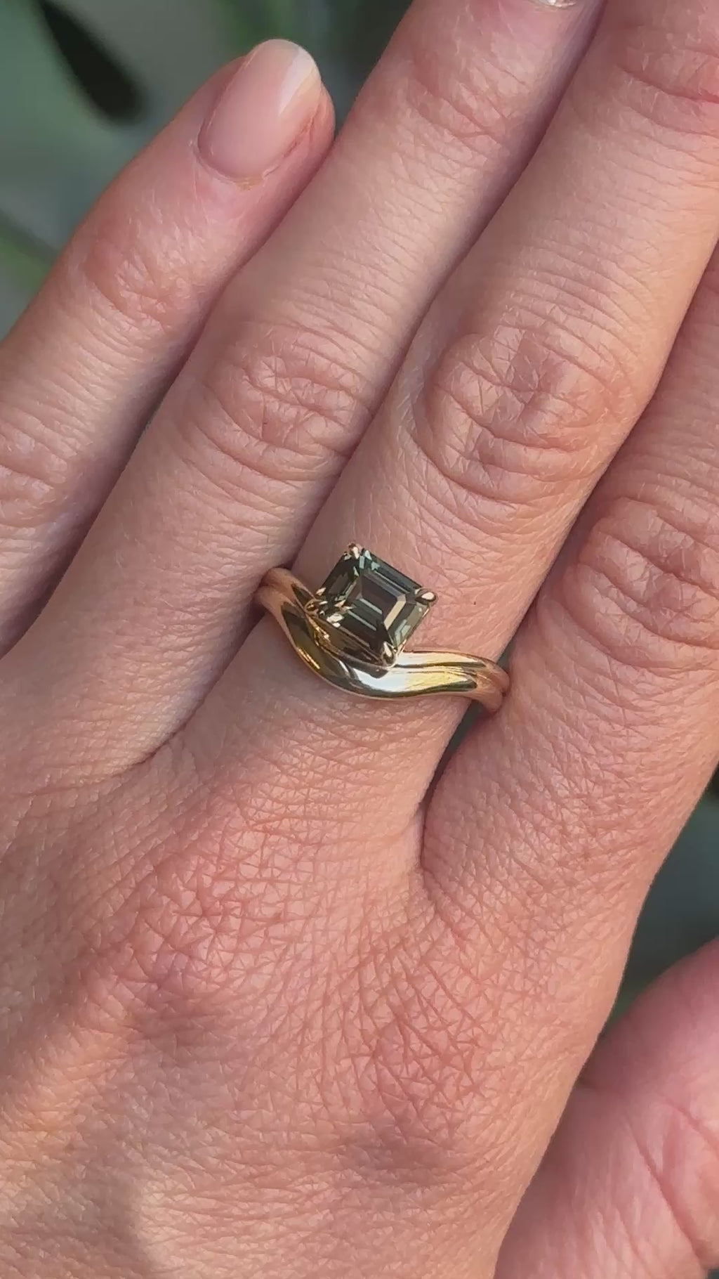 1.65ct Emerald Cut Color Shifting Madagascar Sapphire Prong Set Ripple Contour Solitaire in 14k Yellow Gold