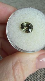 2.22CT OVAL MADAGASCAR SAPPHIRE, COLOR CHANGE OLIVE GREEN YELLOW TO PURPLE CHAMPAGNE, 7.59X6.31X5.45MM
