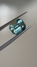 2.14CT EMERALD CUT MADAGASCAR SAPPHIRE, LIGHT GREEN TEAL WITH BROWN, 7.9X6.1X4.7MM, EARLY ACCESS