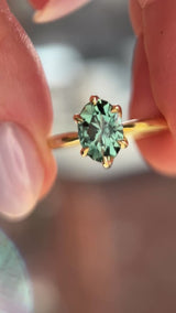 2.07ct Precision Cut Untreated Teal Oval Montana Sapphire Diamond-studded Sea Star Solitaire in 18k Yellow Gold