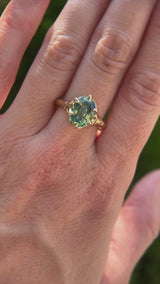 3.29ct Untreated Oval Parti Green Sapphire Low Profile 6 Prong Evergreen Carved Solitaire in 14k Yellow Gold