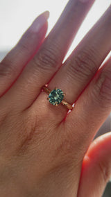 1.75ct Precision Cut Teal Oval Montana Sapphire Four Prong Evergreen Hidden Halo Solitaire in 14k Yellow Gold