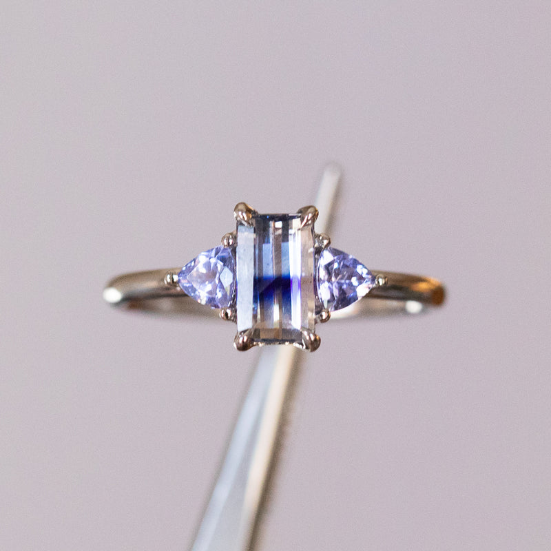 1.11ct Bicolor Emerald Cut Sapphire Three Stone Ring with Tanzanite Trillion Side Stones in Platinum