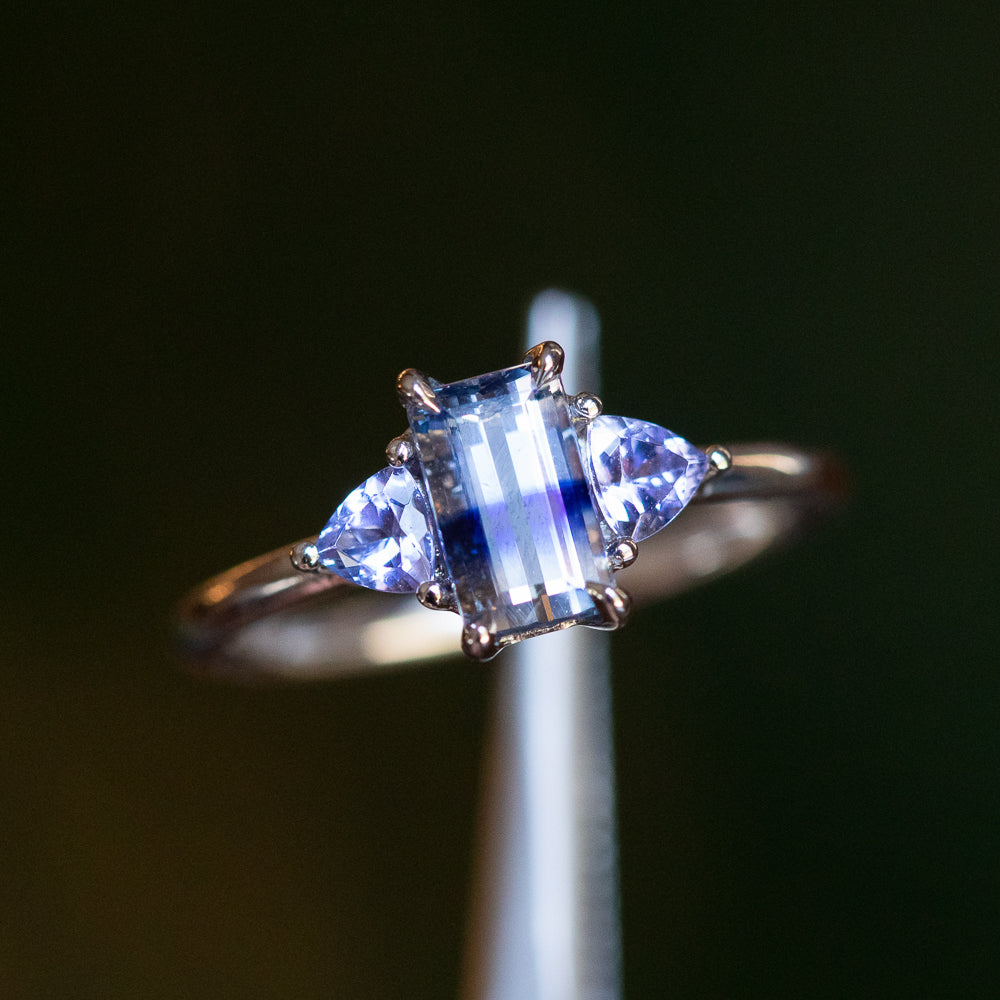 Emerald cut with trillion side stones sales
