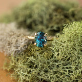1.55ct Oval Teal Montana Sapphire Engagement Ring in 14k Yellow Gold Evergreen Solitaire