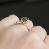 1.55ct Oval Teal Montana Sapphire Engagement Ring in 14k Yellow Gold Evergreen Solitaire
