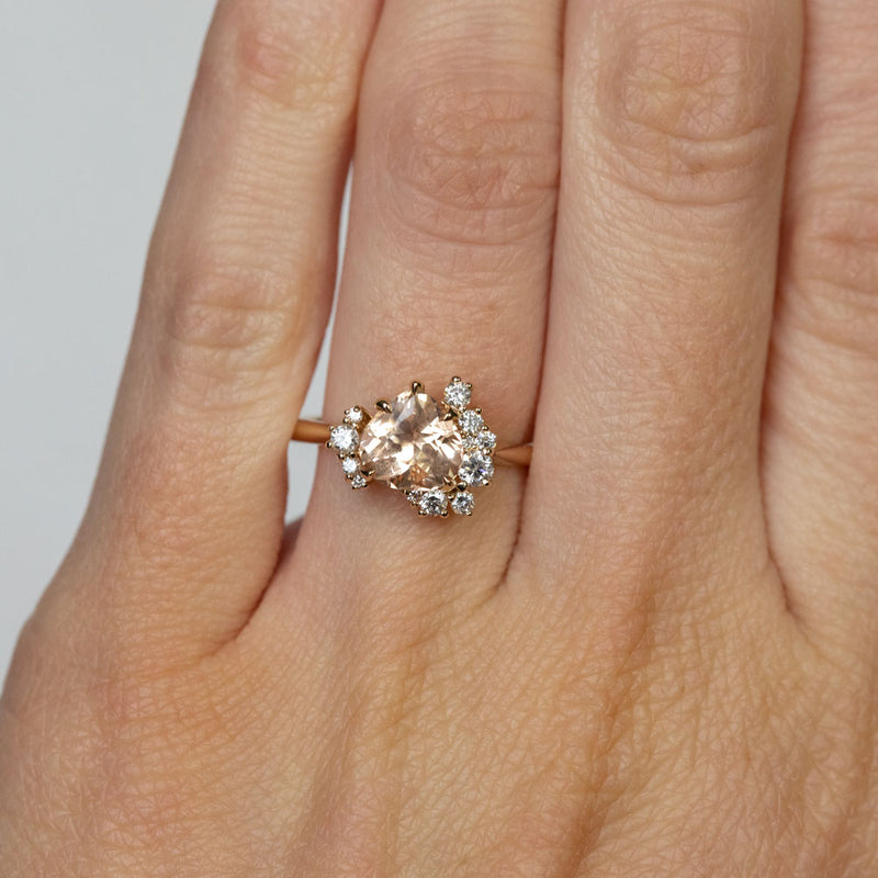 1.64ct Peach Sapphire and Asymmetrical Diamond Cluster Ring in 14k Yellow Gold on hand